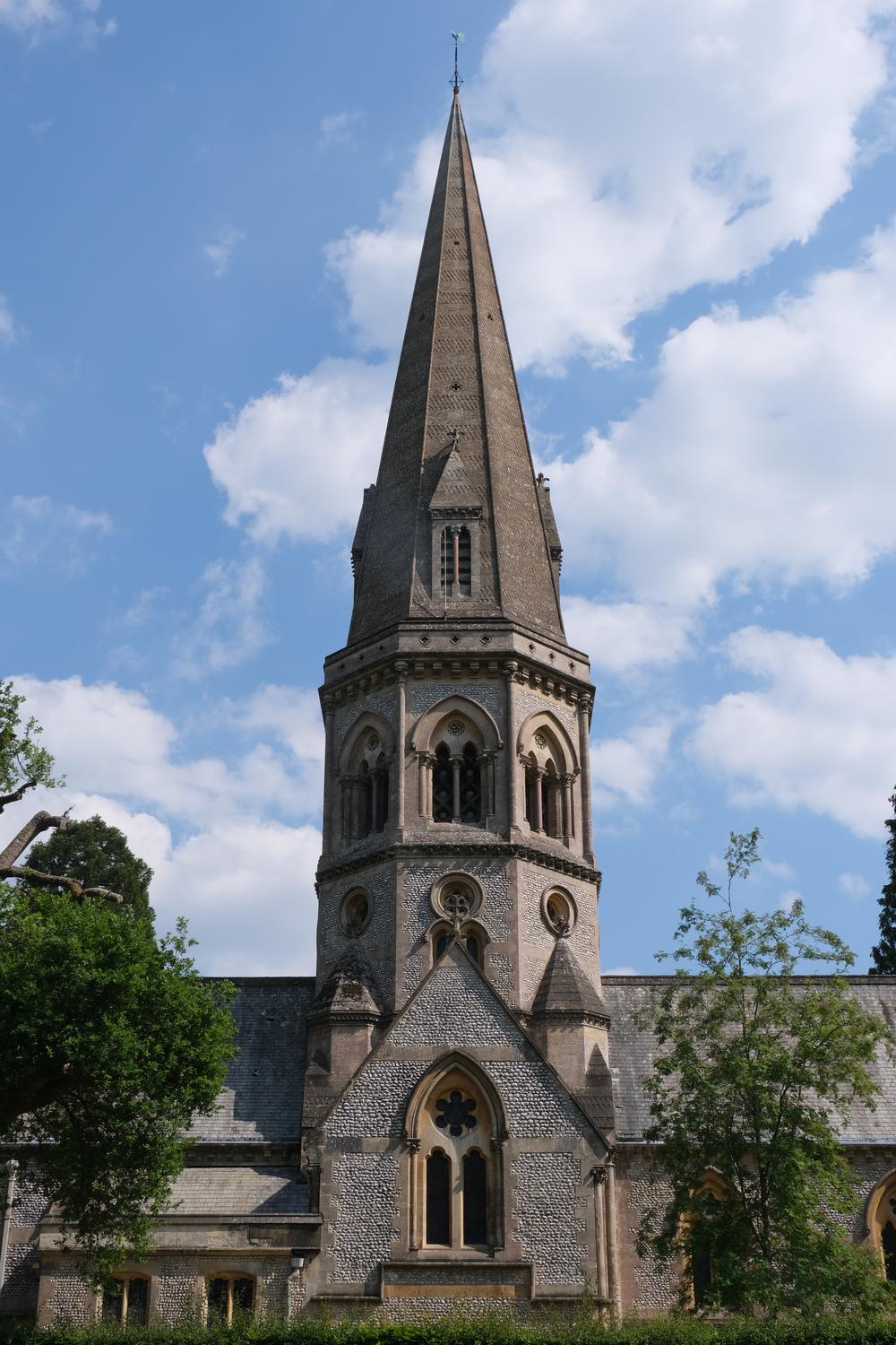 A church steeple stretches into the sky