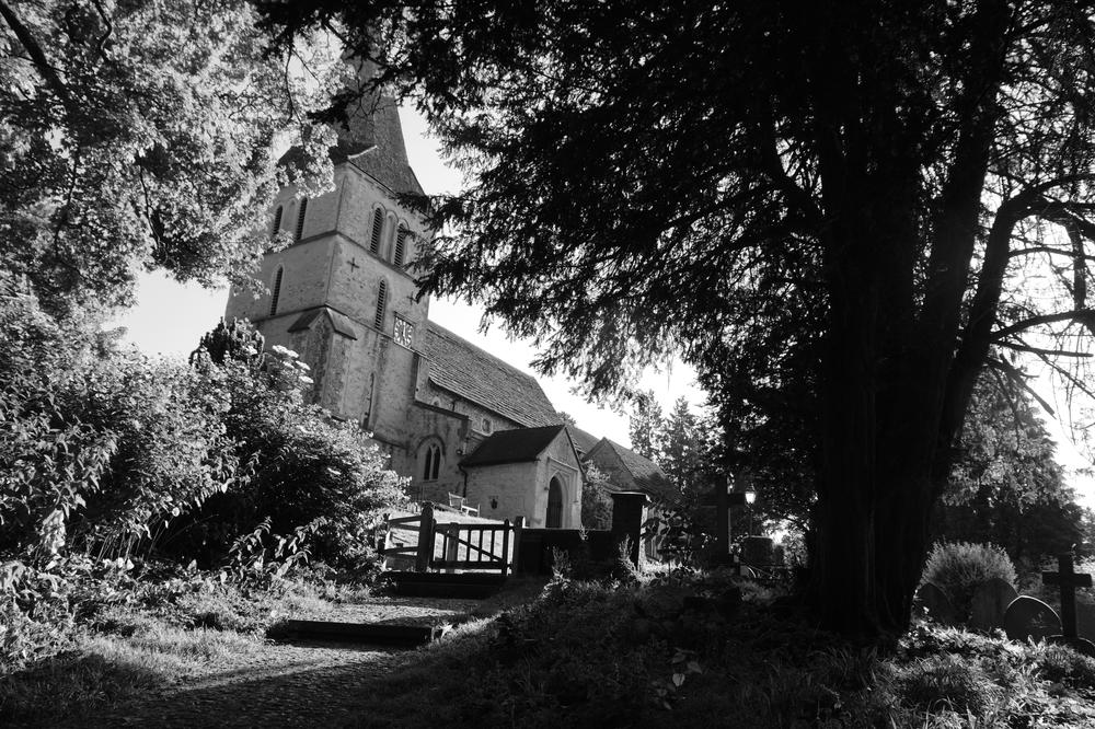 A path leads up to a traditional church