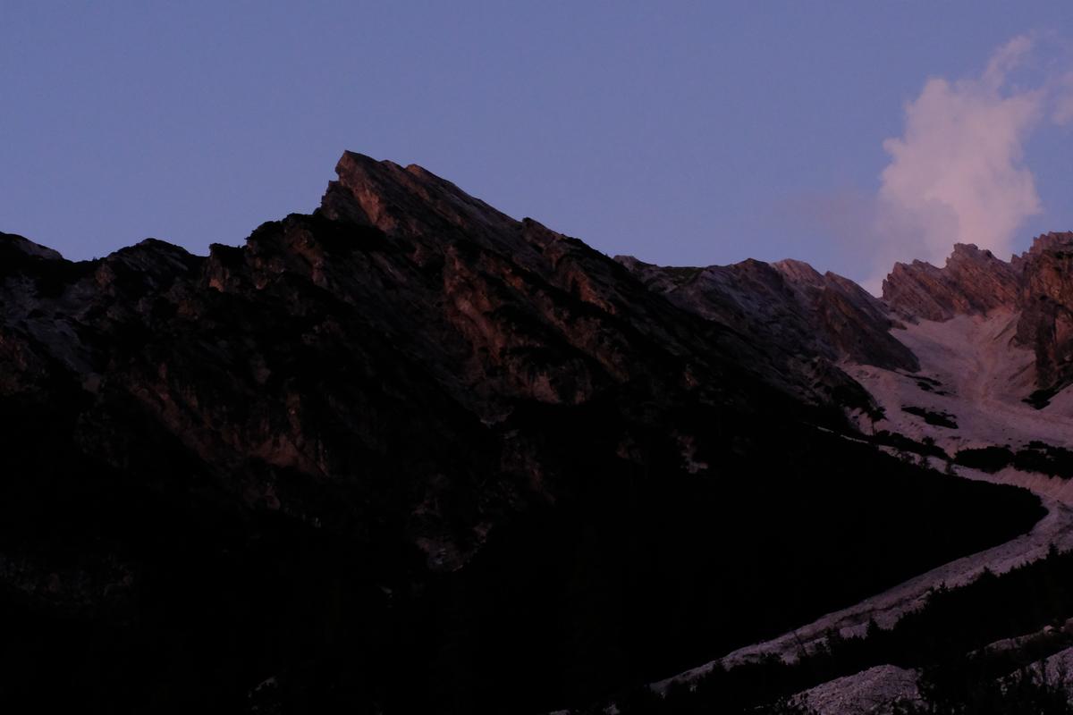 A jagged ridgeline arrayed ahead as I climb into the Dolomites, Italy